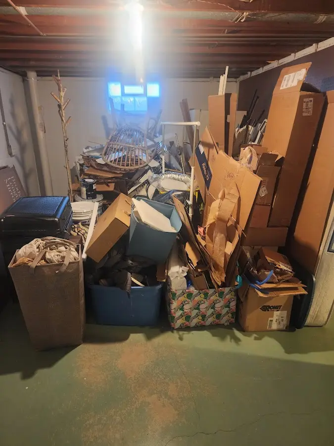 Roll-off dumpster container at job site for Yard Waste Dumpster Rental in North Port